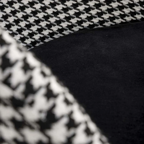 Juodos, baltos ir auksinės spalvos sofos su aksominiu audiniu