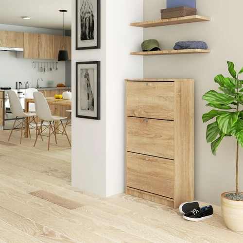 Patvari spintelė su varstomomis durimis ir krepšeliais