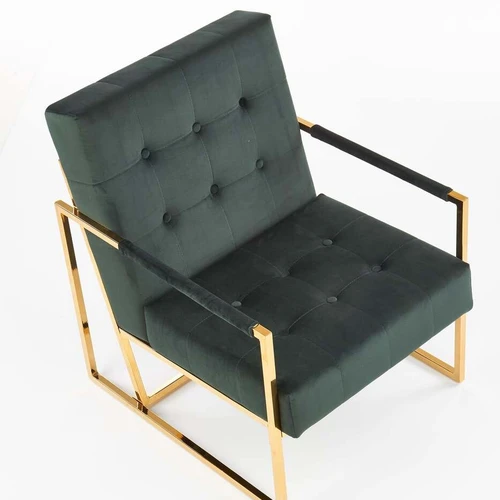 Minkšta tamsiai žalia kėdė su aukso kojomis ir patvaria medžiaga