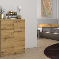 Ruda komoda su ritininiais bėgeliais