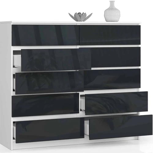 Patogi komoda su stumdomais stalčiais