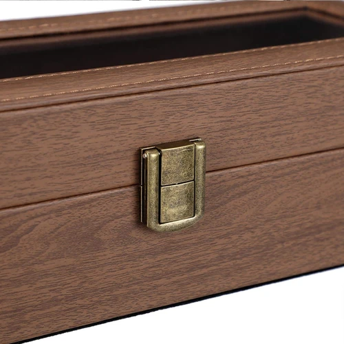 Ruda laikrodžių dėžutė su medžio drožlėmis