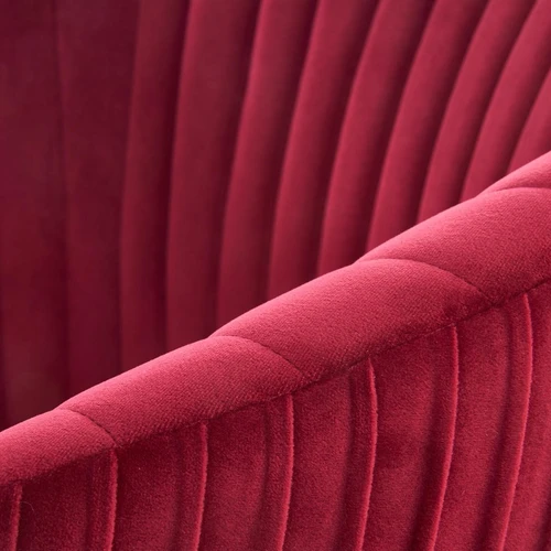 Stilinga sofos lova tamsiai raudonais apmušalais ir aukso spalvos kojomis