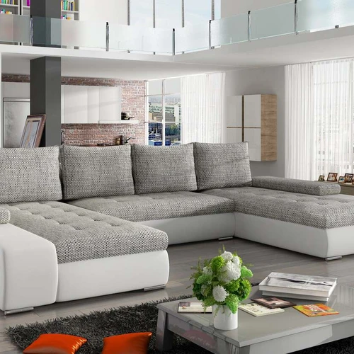 Unikalaus dizaino kampinė sofa su platiais porankiais ir didelėmis pagalvėlėmis