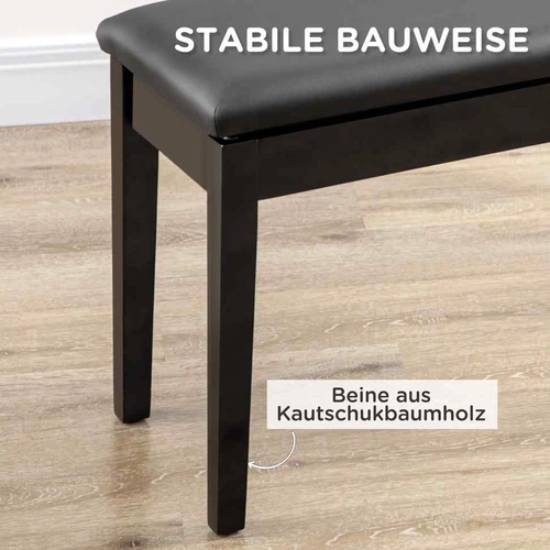 Juodas blizgus pianino suolas su kėde