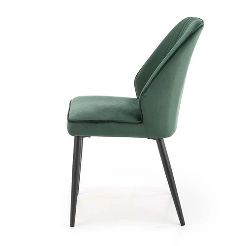 Elegantiška tamsiai žalia sofos pagalvė su aksominiu audiniu