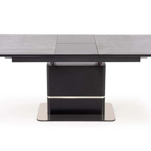 Modernus tamsiai pilkas stalas su juodomis kojomis