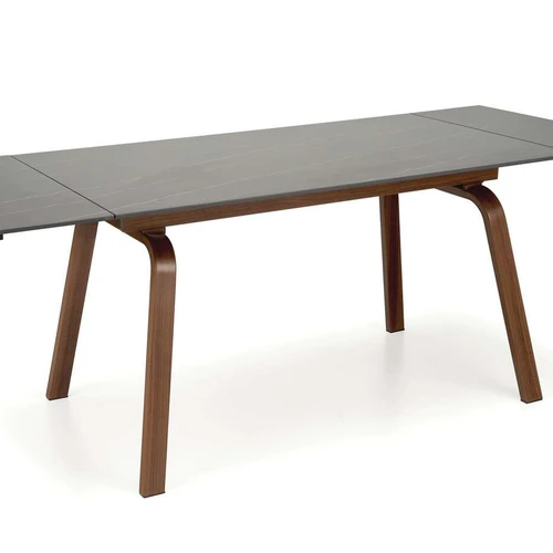 Prašmatnus prailginamasis stalas su juodu marmuru ir riešuto spalvos kojomis